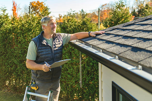 Professional Roof Replacement technician working in Otego, NY
